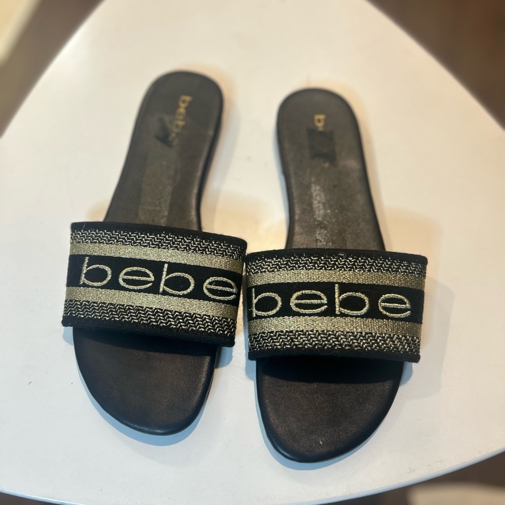 Bebe Women's Sandals in Black with Gold Accents
